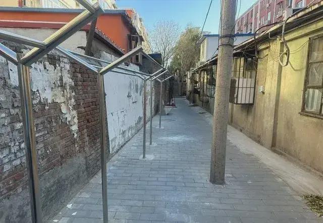 私搭乱建居民想提升小区环境的愿望实现了AG凯发成为马竞合作拆除700平方米(图3)